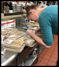 Community Health worker labeling food