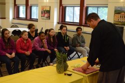 8th graders listen to a speaker