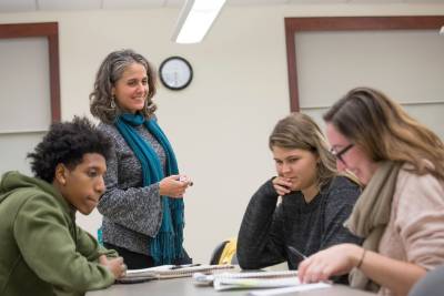 professor speaking to her students