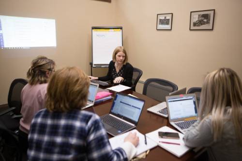 Students and professor in a discussion