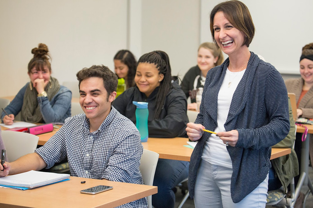 Professor smiling with her class