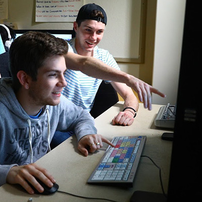 students working on a computer