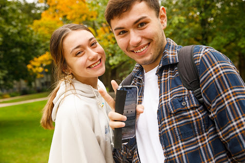 two smiling students