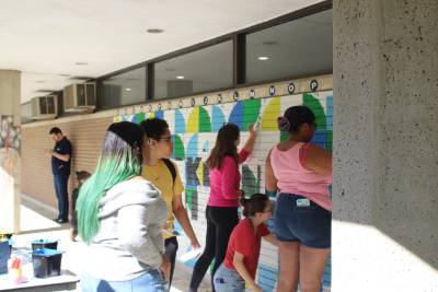 students painting