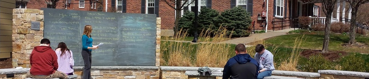 Professor and students at an outside classroom