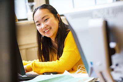 Smiling student in class